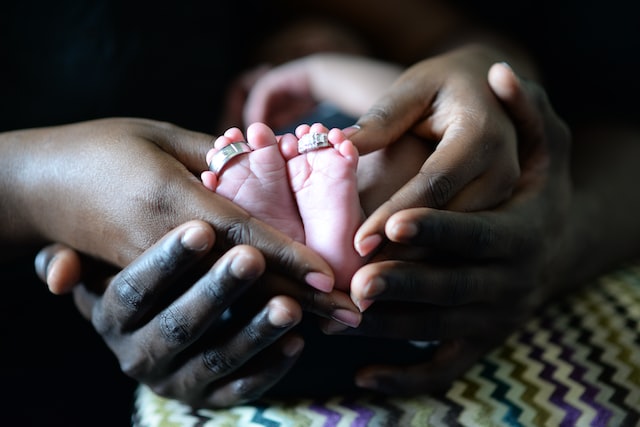  Werewolf Love: Baby feet with Parent's hands